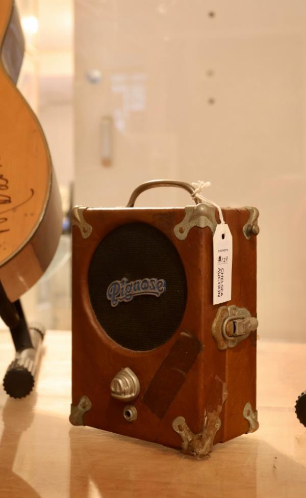 a small pignose brand portable guitar amplifier