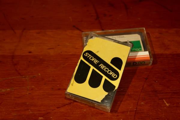 two demo tapes, one with a cover reading 'Store Record'